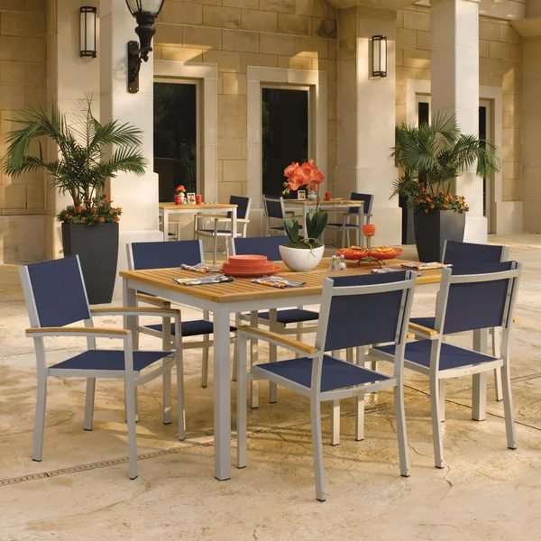 Oxford Garden Travira 7 Piece Flint Aluminum Patio Dining Set W/ Ink Pen Sling Armchairs & 63-Inch Rectangular Natural Tekwood Table
