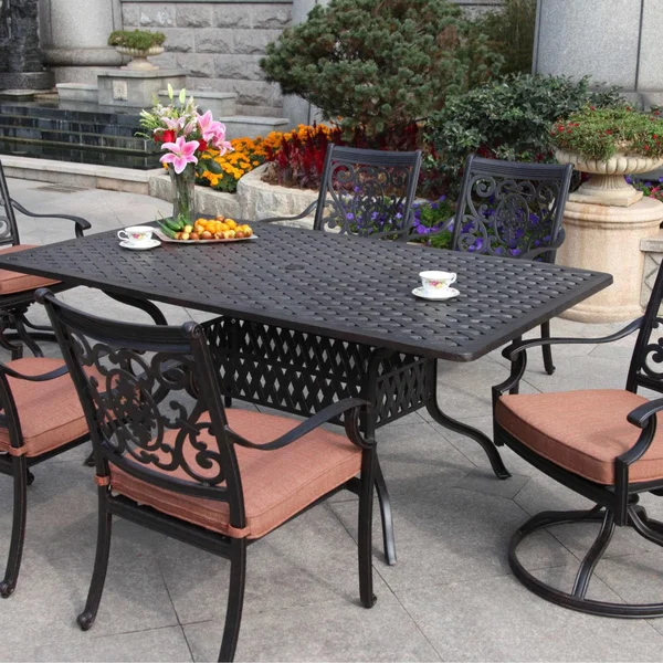 St. Cruz 7 Pc Cast Aluminum Dining Set w/ 72 X 42 Inch Series 30 Table & 2 Swivel Rockers in Antique Bronze/Spicy Chili by Darlee