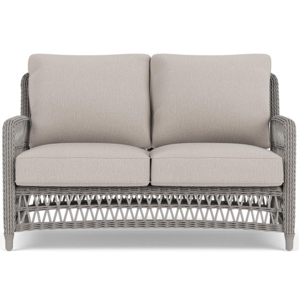 Mackinac Wicker Loveseat in Putty/Remy Cloud by Lloyd Flanders