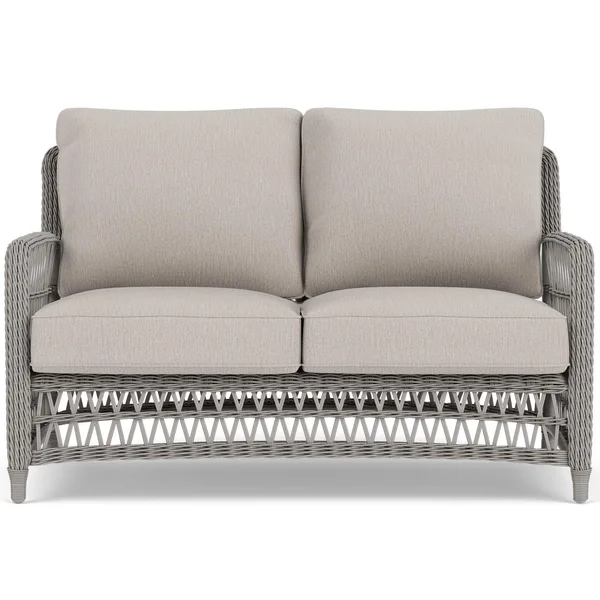 Mackinac Wicker Loveseat in Putty/Remy Cloud by Lloyd Flanders