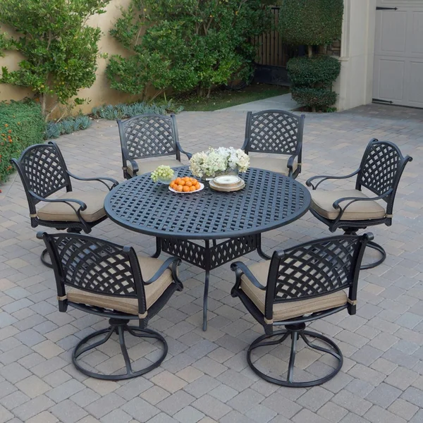 Nassau 7 Pc Cast Aluminum Dining Set w/ Rocker in Antique Bronze w/ Sesame Cushions By Darlee