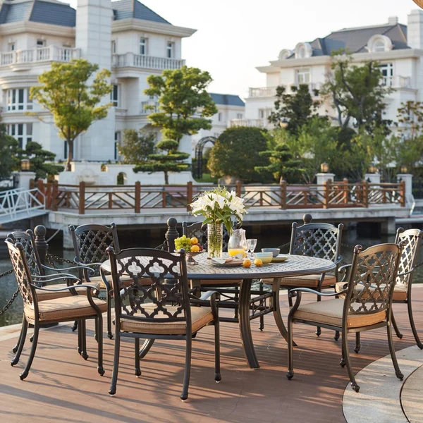 Madison 9 Pc Cast Aluminum Dining Set w/ 71 Inch Round Series 99 Table in Antique Bronze/Sesame by Darlee