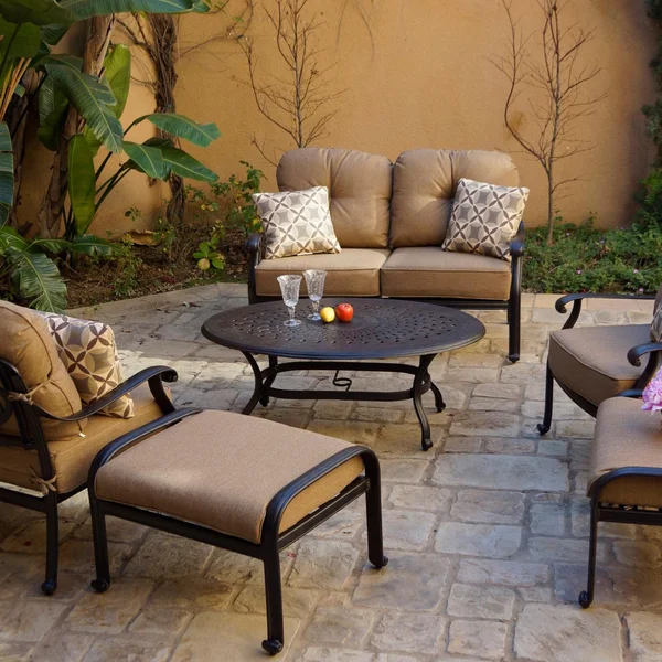 Elisabeth 6 Pc Cast Aluminum Loveseat Seating Set w/ 46 X 31 Inch Oval Table & Throw Pillows in Antique Bronze/Sesame by Darlee